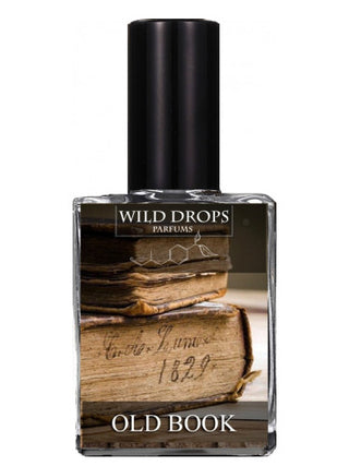 Old book Wild Drops Parfums for women and men - luxury perfume bottle on white background