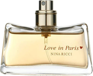 Love in Paris Nina Ricci Womens Perfume - Elegant fragrance bottle with floral design on white background