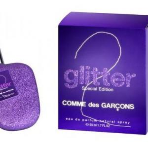 Sure! Here is a suggestion for the SEO image alt text for the perfume image:

Glitter Comme des Garcons Perfume for Women and Men - Unisex Fragrance in Elegant Bottle

This alt text is concise, includes relevant keywords such as the perfume name and target audience, and is