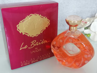 Le Baiser Lalique Perfume for Women - Elegant Fragrance Bottle on White Background